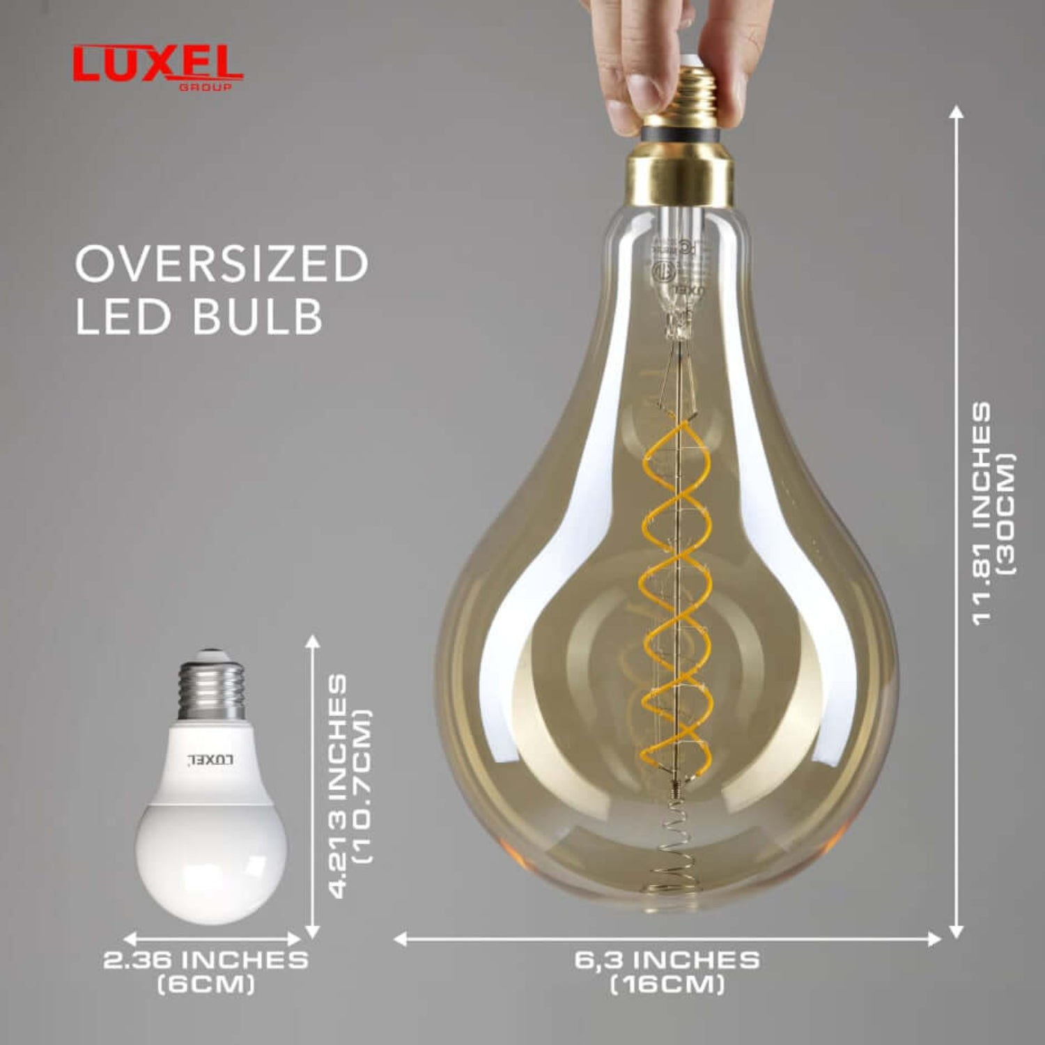 Hand holding Luxel oversized LED Edison bulb, demonstrating its 11.81 inch height and wide 6.3 inch diameter.