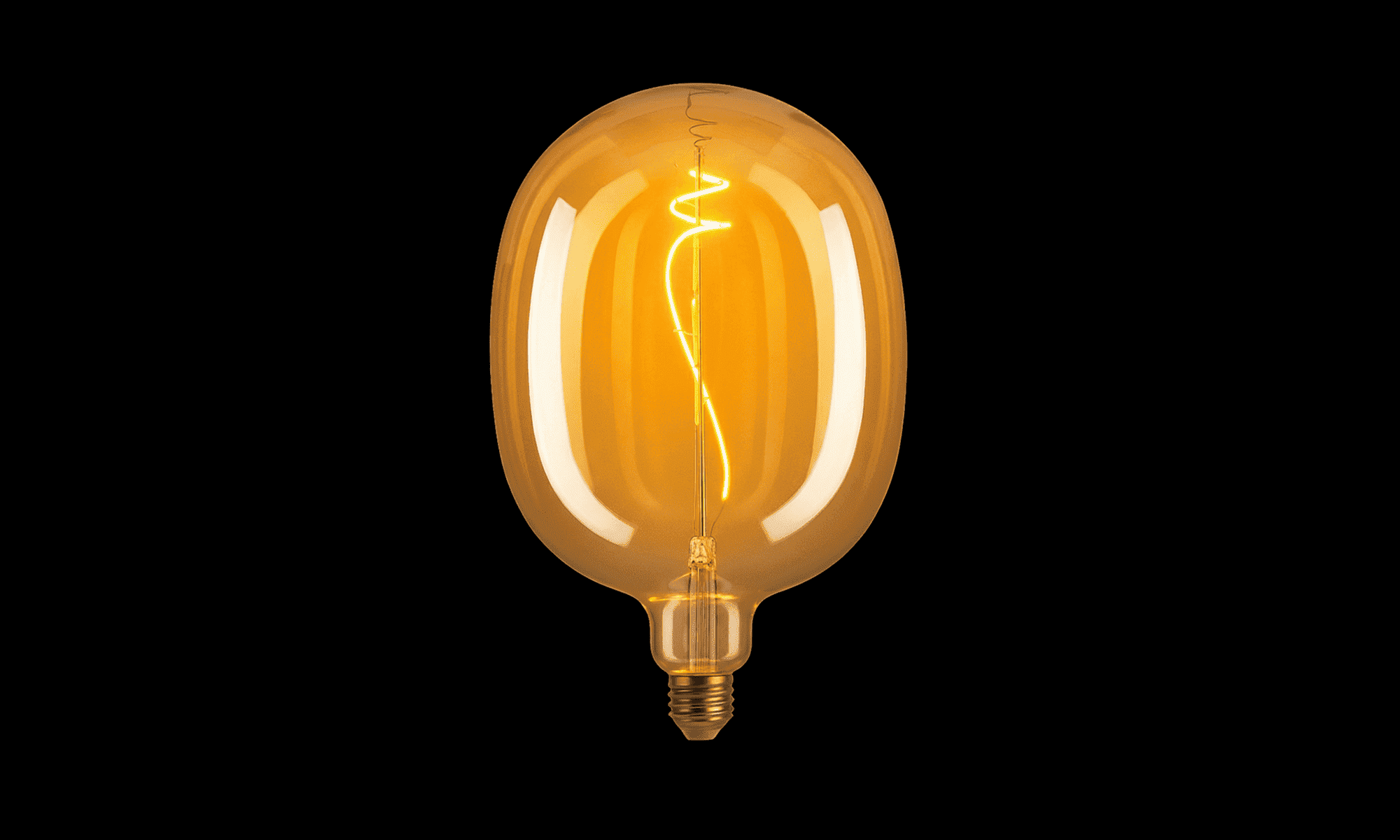 Vintage-style light bulb on a black background