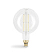 Clear LED light bulb with gold base on a white background