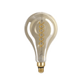 Vintage-style light bulb with clear glass and gold base on a white background