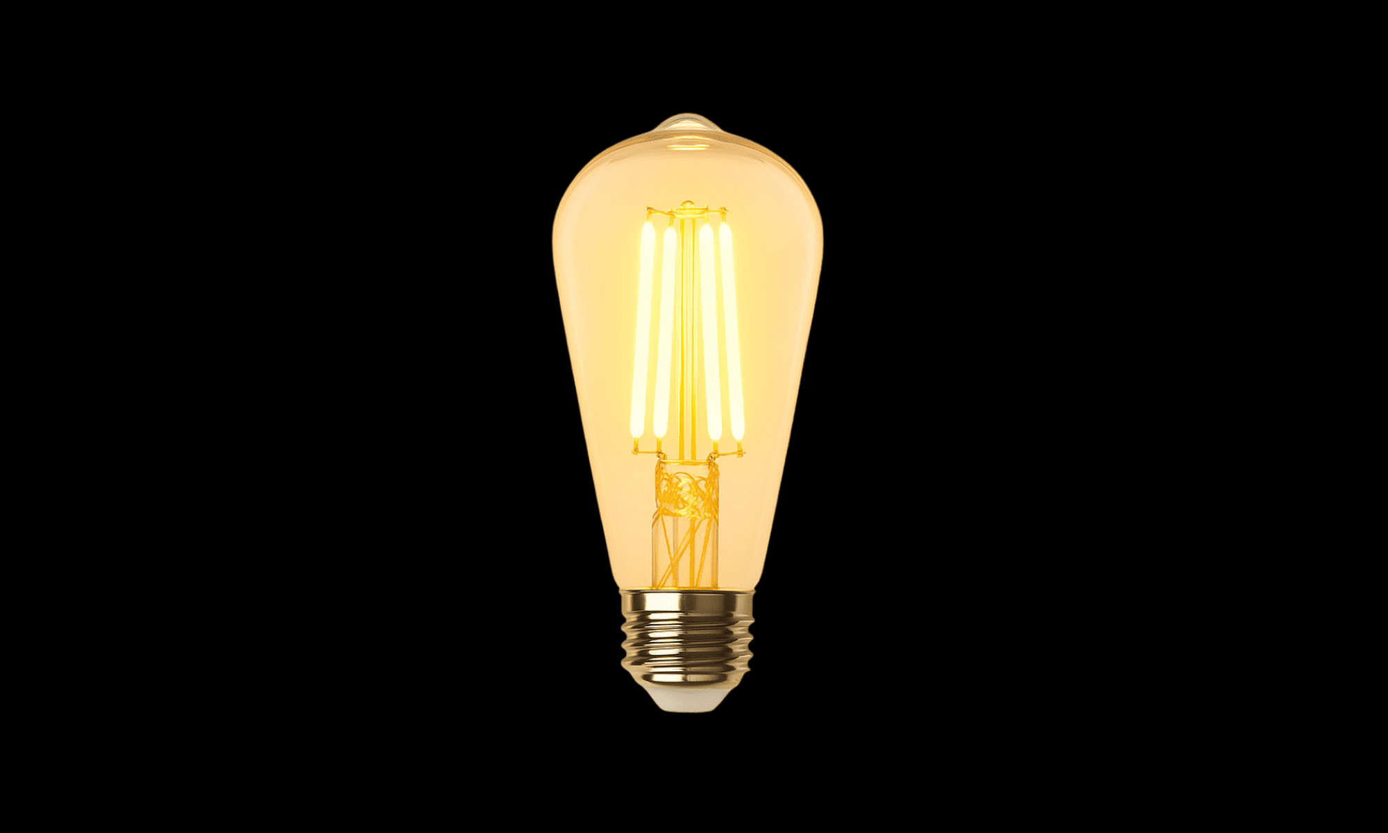 Vintage-style light bulb on a black background